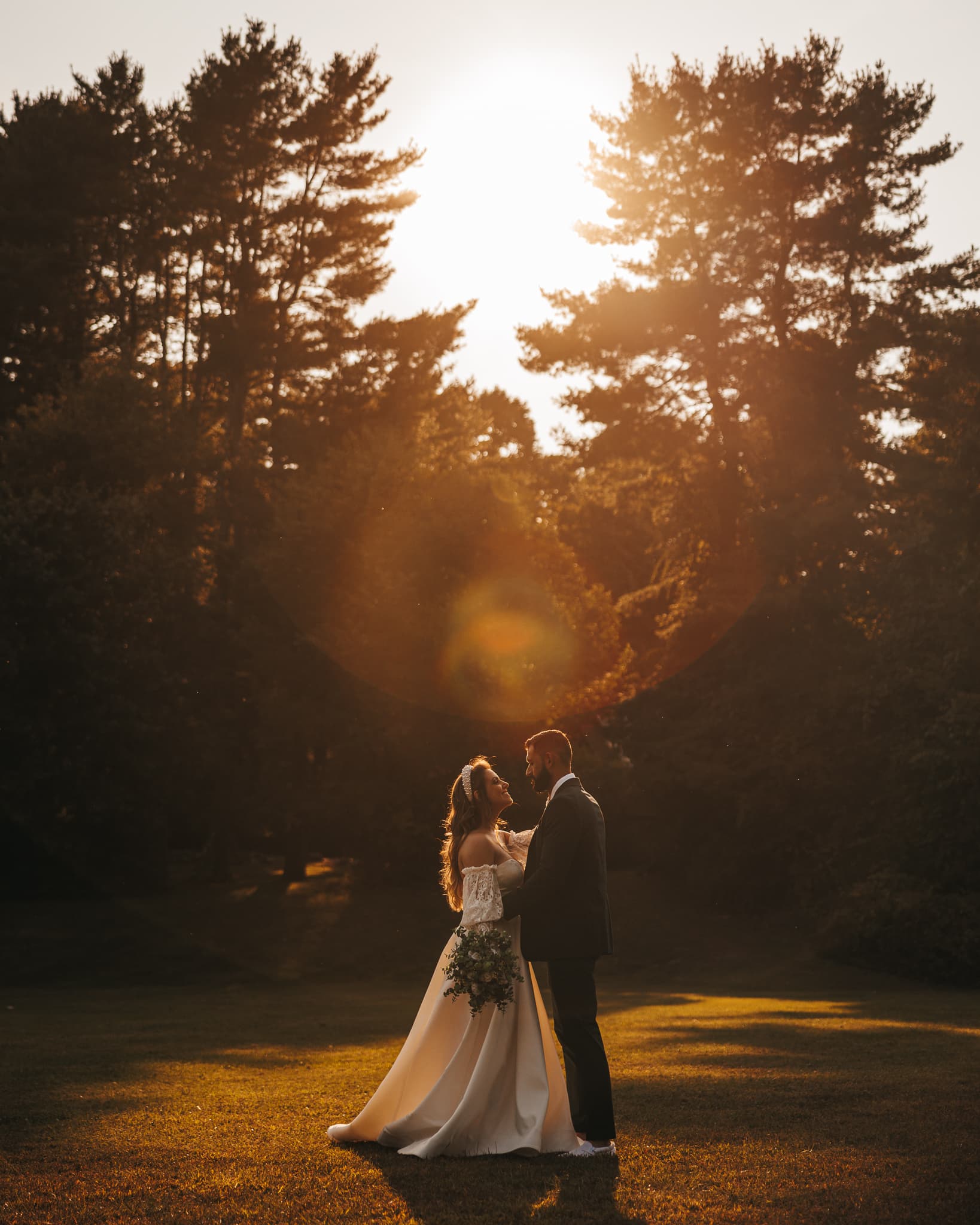 Couple silhouetted at golden hour